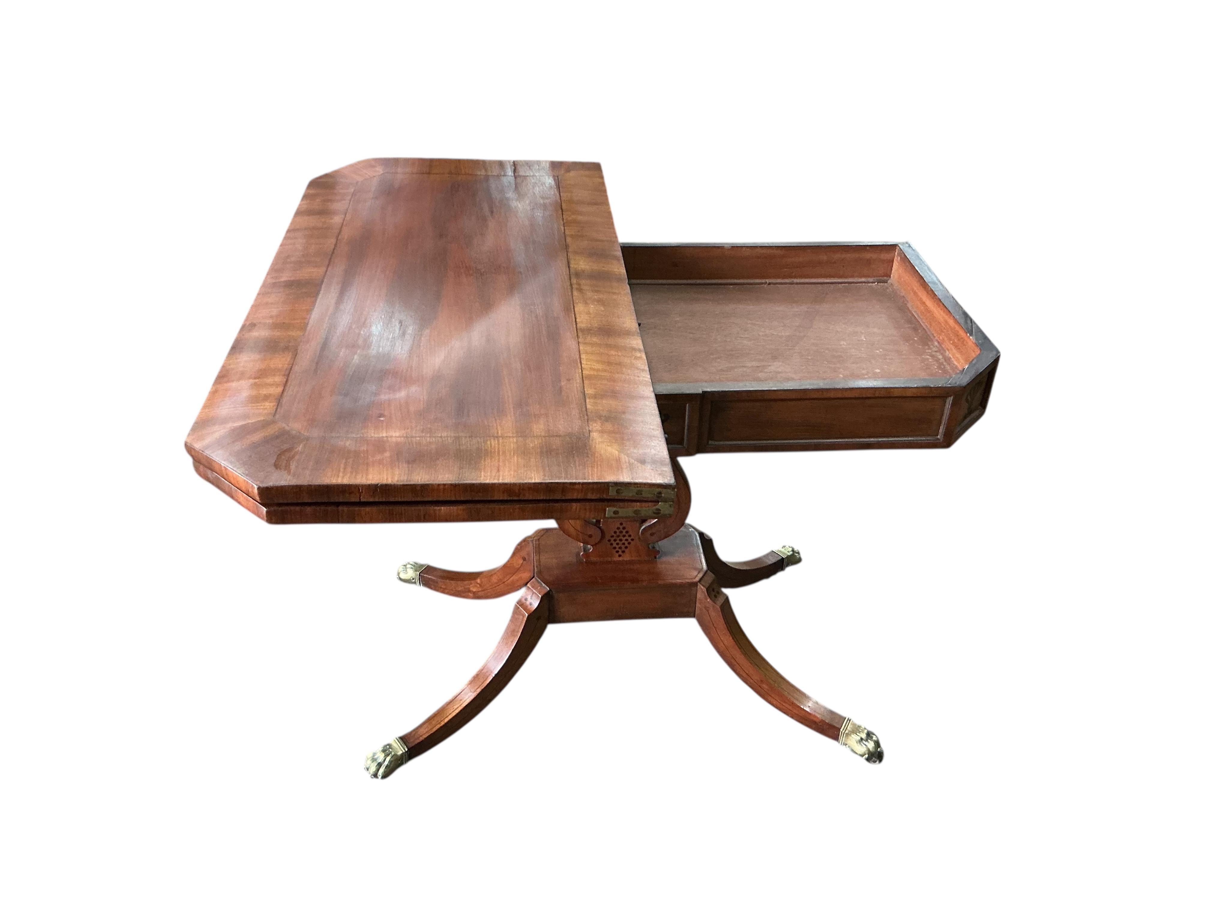 A Regency inlaid mahogany folding card table, width 92cm, depth 46cm, height 73cm